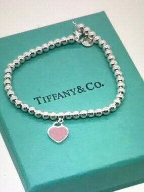 Tiffany & Co. Silver Bracelet with Pink Heart Charm